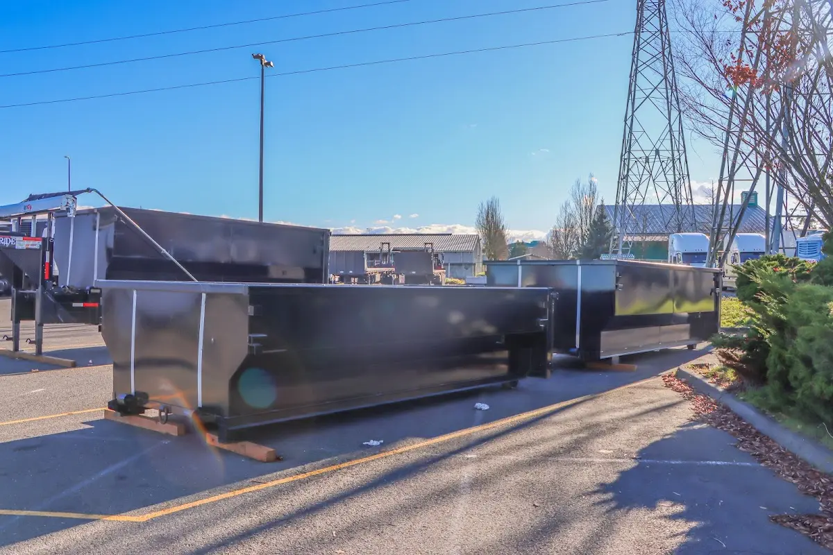 Roll-off dumpster ready for waste disposal at job site for 2 Yard Dumpster Rental in Harvard